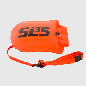An orange colored swim buoy with an adjustable strap