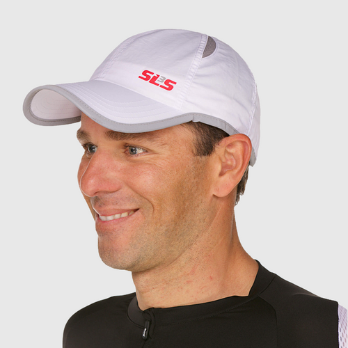 Profile view of a man wearing a white running cap