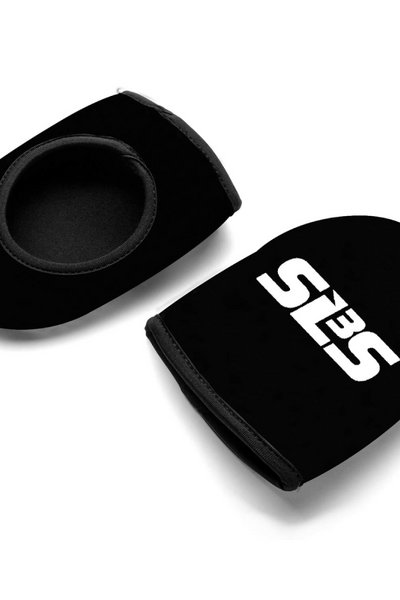 A pair of black neoprene cycling toe covers with white SLS3 logo