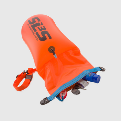 A bright orange swim buoy, perfect for storing items