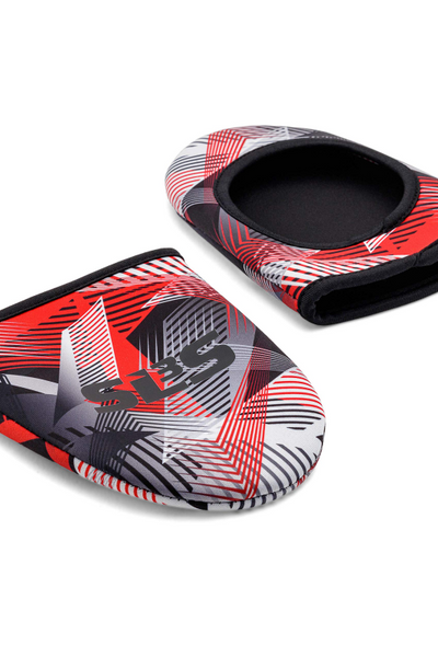 A pair of red, black, and white graphic print neoprene cycling toe covers