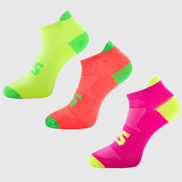 A group of colorful neon running socks in green, red, and pink