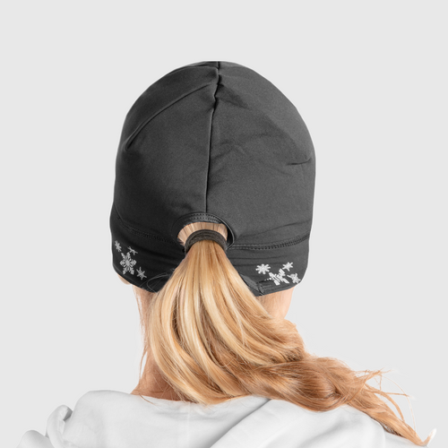 Back view of a woman wearing a black ponytail beanie