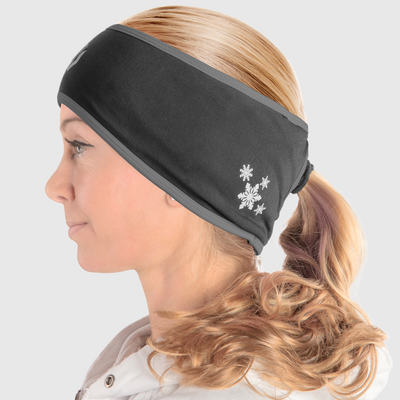 A side view of a woman wearing a black and gray ponytail headband