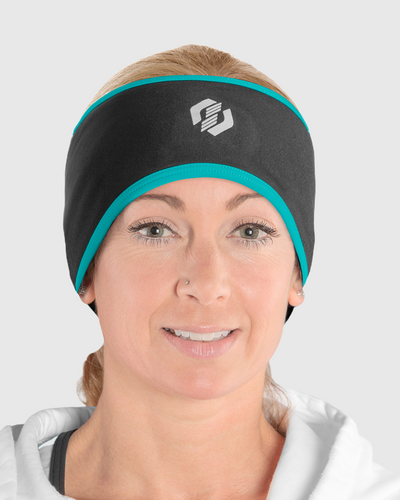 A woman wearing a black and blue ponytail headband
