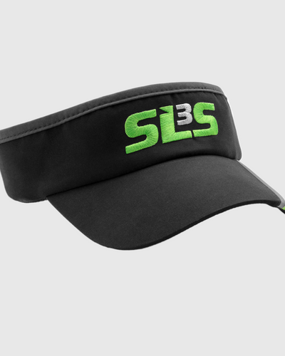 A black SLS3 running visor with green lettering