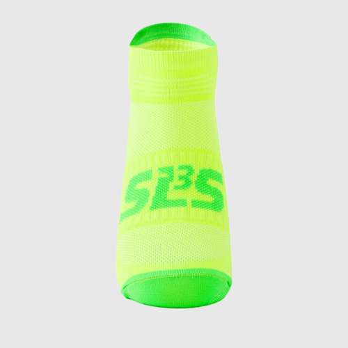 A yellow and green running sock with SLS3 logo