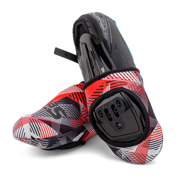 A pair of red, black, and white patterned cycling toe covers