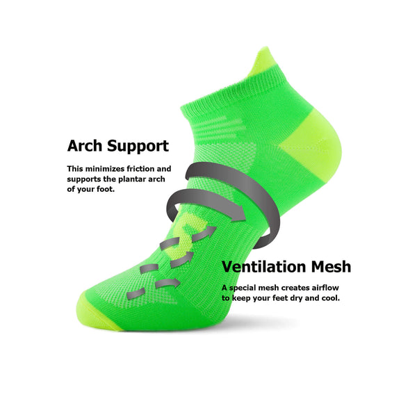 A green running sock with ventilation mesh and arch support